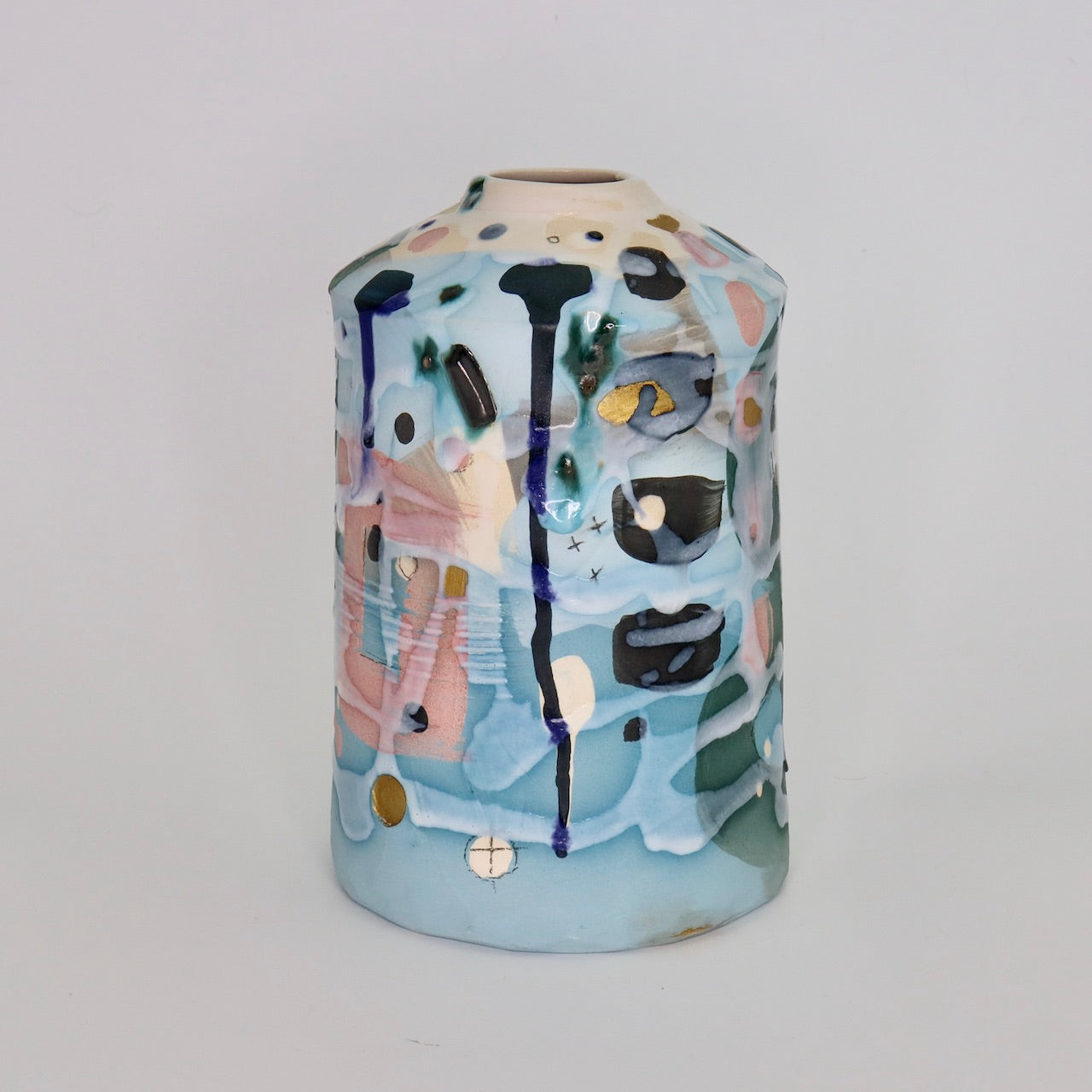 a textured pale blue and pink ceramic bottle by Dawn Hajittofi, UK ceramicist
