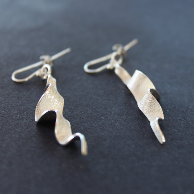 textured silver wave-like drop earrings by Beverly Bartlett