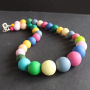 a multicoloured bead necklace by UK jewellery designer Clare Lloyd.