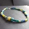 random shaped necklace in blues and greens by Clare Lloyd, UK Jewellery Designer