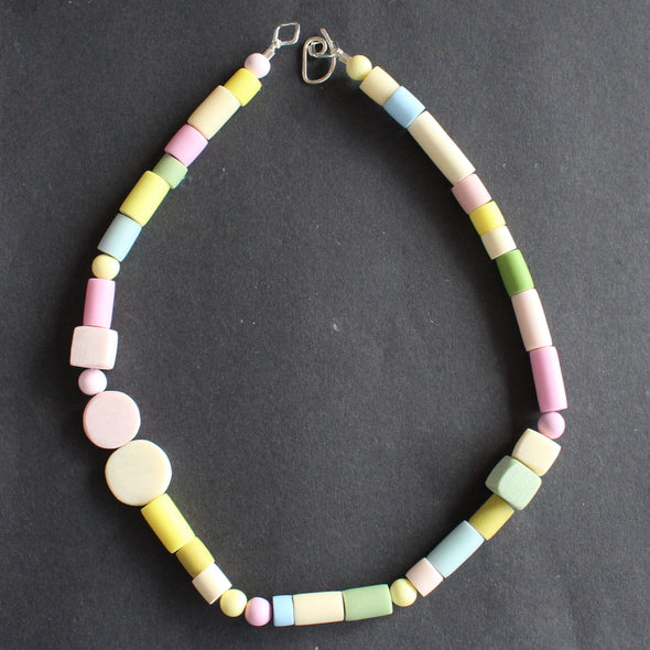 necklace of pastel coloured random shaped beads by UK jeweller Clare Lloyd 
