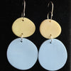 earrings made by UK jeweller Clare Lloyd of blue disc and smaller yellow disc