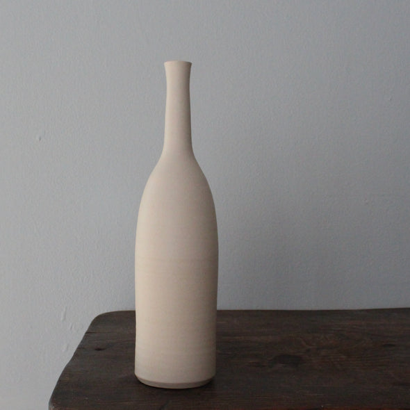 a ivory coloured ceramic bottle by uk ceramicist Lucy Burley.