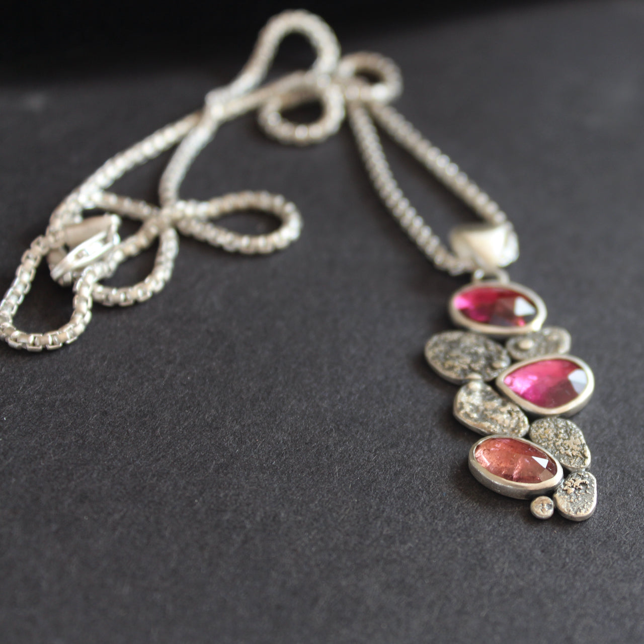 silver pendant with silver discs and pink tourmaline stones on a sliver chain by UK Jewellery Designer Carin Lindberg