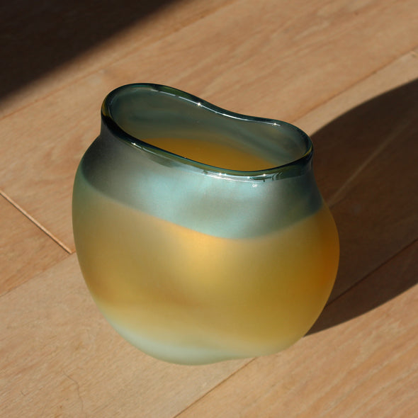 glass artist Michele Oberdieck's tulip shaped glass vessel in opaque blue and amber glass.