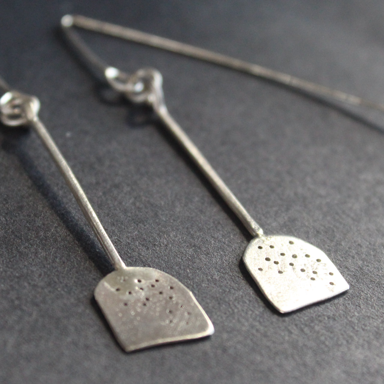 silver paddle shaped earrings by jewellery lizzie weir of Anatole Design