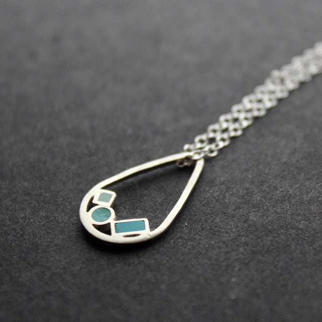 silver necklace with blue details 