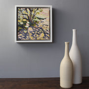 Jill Hudson abstract oil painting framed and on a grey wall next to two ceramic bottles by UK ceramicist Lucy Burley 