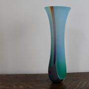 a blue glass vase with yellow stripe by UK glass artist Ruth Shelley.
