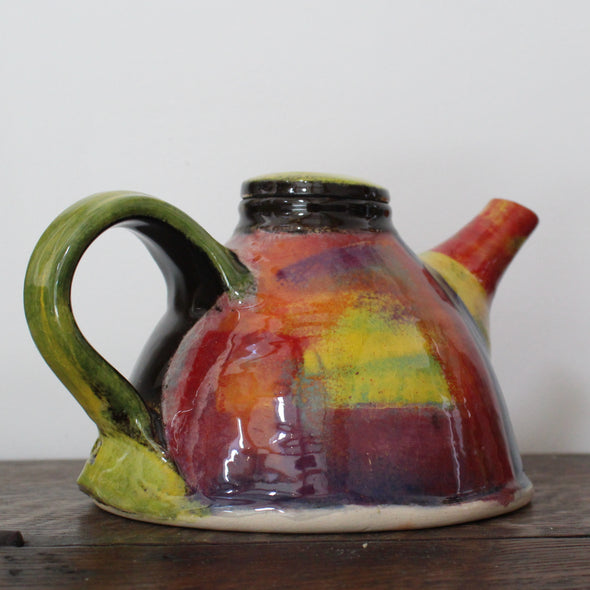 brightly coloured ceramic tea pot by UK potter John Pollex