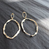 Handmade sliver earrings with two wave inspired hoops by Cornish jewellery designer Claire Stockings-Baker