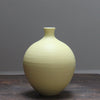 Pale primrose round ceramic bottle by Lucy Burley at the Byre Gallery