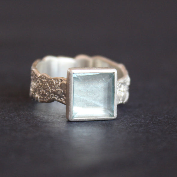 silver ring by Cornwall Jeweller Carin Lindberg with a square set pale blue aquamarine stone 