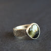 textured silver ring with a dark green stone by UK jeweller Carin Lindberg 