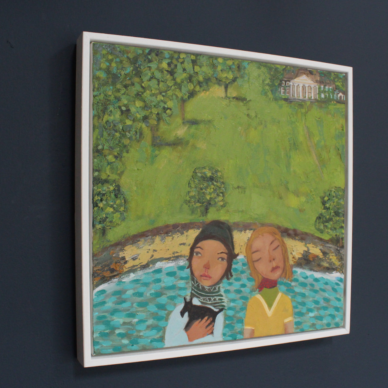 A Siobhan Purdy painting of two women, one holding a small dog, on a boat with some sea, shoreline and a formal green garden in the background.