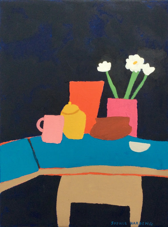 Painting of a blue cafe table with brightly coloured cups and teapot and vase of flowers. By Sophie Harding