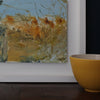 warm yellow ochre painting of grass with the pale blue sky by Cornish based painter Katy Brown 