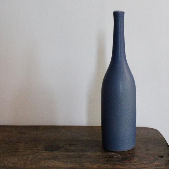 a purple coloured ceramic bottle by UK ceramic artist Lucy Burley 