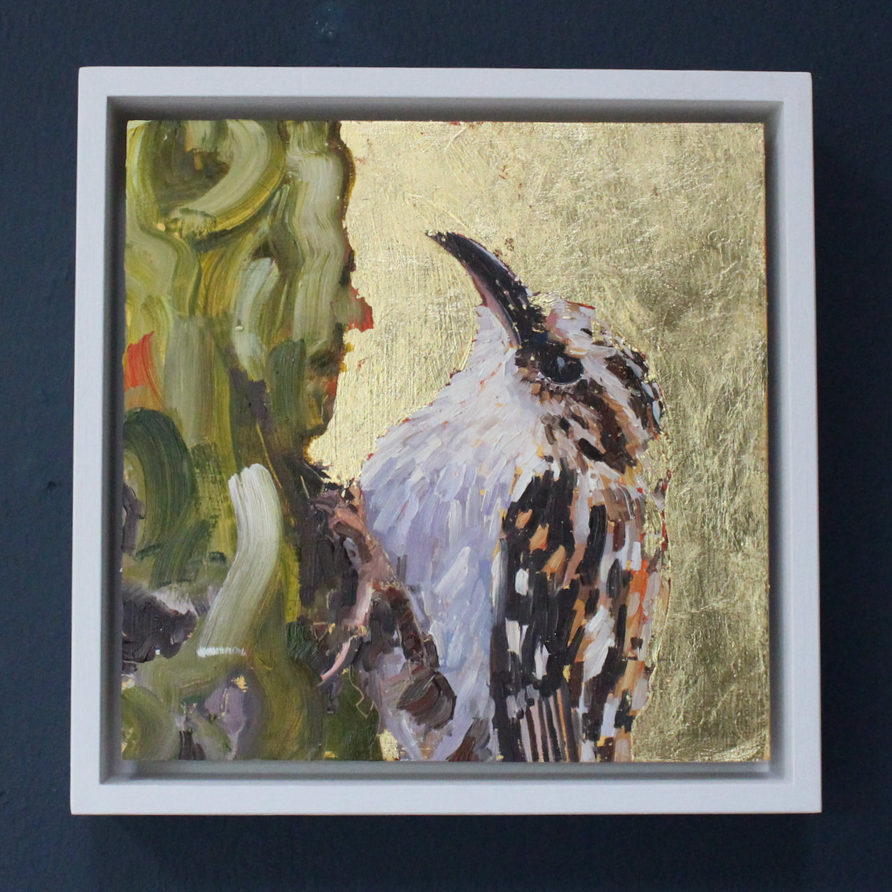 a Jill Hudson painting of a tree creeper bird with white plumage, brown beak on a gold background.