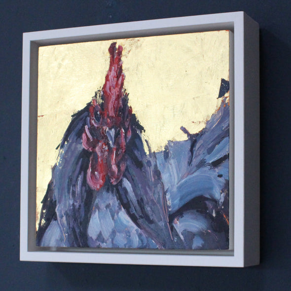 framed Jill Hudson painting of a cockerel with dark purple feathers and a red head against a gold-leaf background.