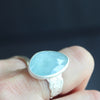Aquamarine ring in textured sterling silver by Carin Lindberg on finger
