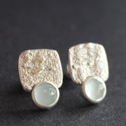 Square textured studs with Aquamine by Carin Lindeberg