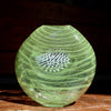 Glass vessel in green waves by Benjamin Lintell