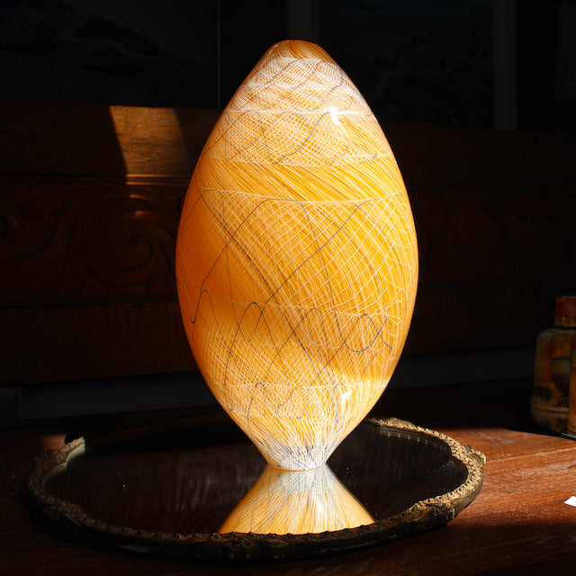 Tall glass vessel in orange by Benjamin Lintell