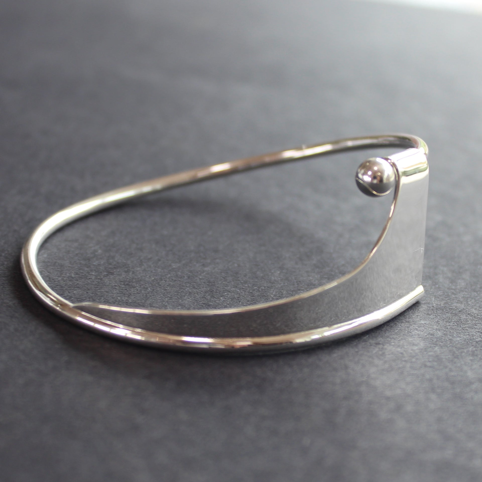 Abstract silver Ancien bangle by Beverly Bartlett