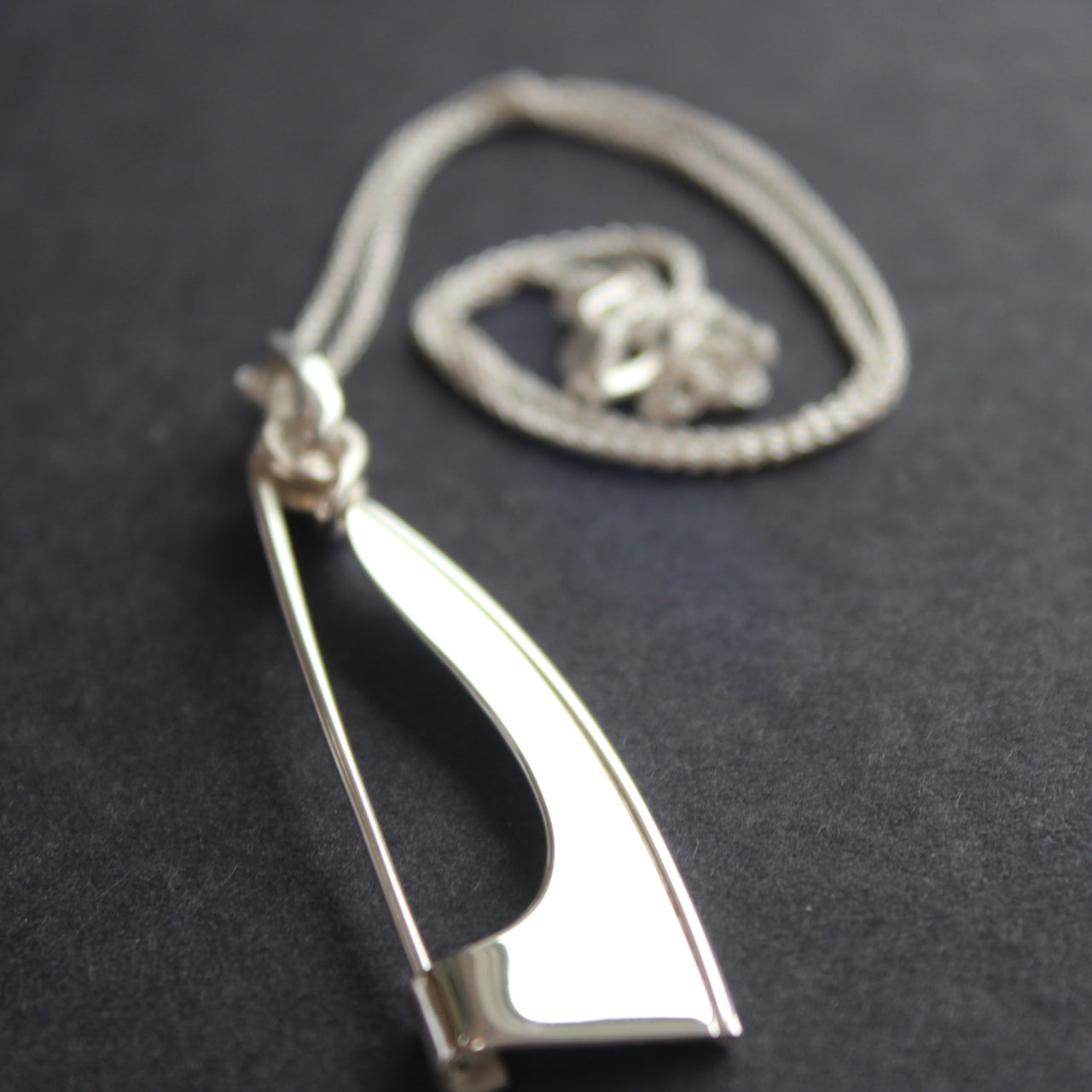Abstract silver Ancien pendant/brooch by Beverly Bartlett