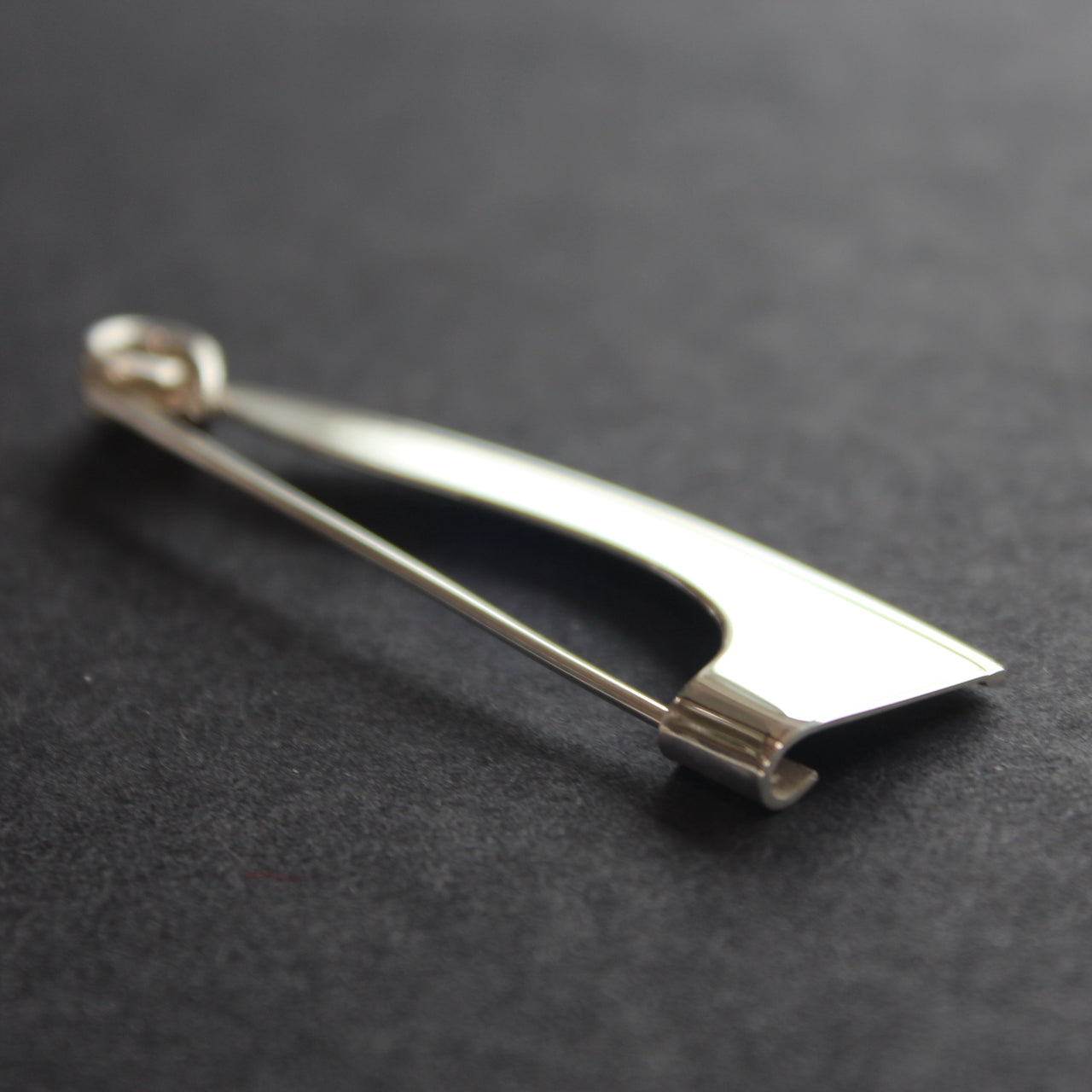 Abstract silver Ancien pendant/brooch by Beverly Bartlett