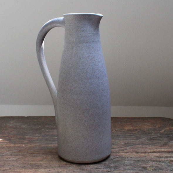 a soft grey coloured ceramic jug with handle by Lucy Burley 