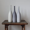 Trio of ceramic bottles in shades of grey by Lucy Burley 