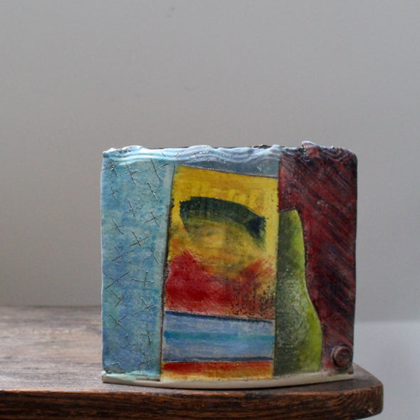 brightly coloured ceramic rectangular vessel by well known potterJohn Pollex