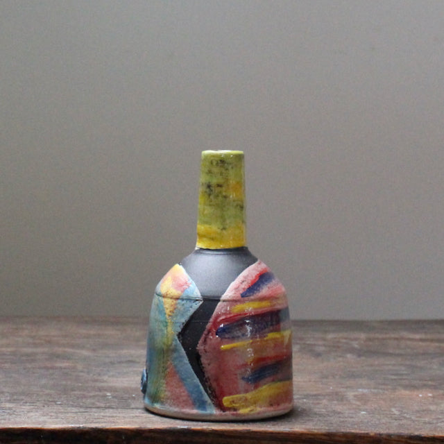 A small ceramic bottle by leading UK ceramicist John Pollex it has an abstract decoration