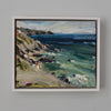 A framed painting of Rame Head in Cornwall by Jill Hudson showing blue sea with pink cliffs.