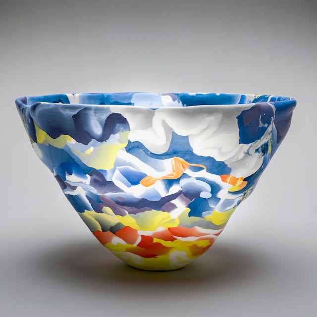 large porcelain Nerikomi bowl in orange, blue and white  by Judy McKenzie.