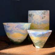 three ceramic vessels in blue, yellow and green by Judy Mckenzie.