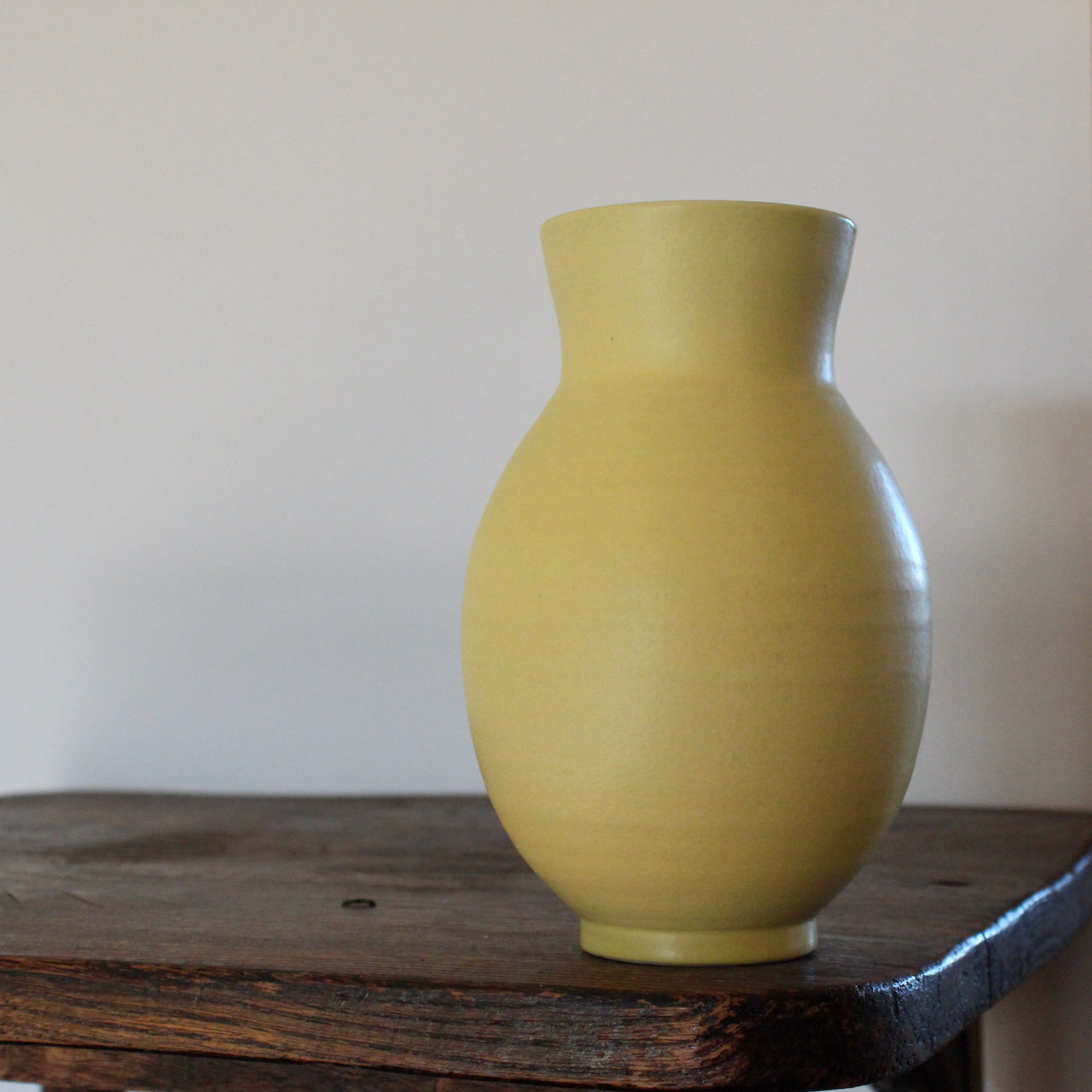 yellow vase by UK ceramic artist Lucy Burley