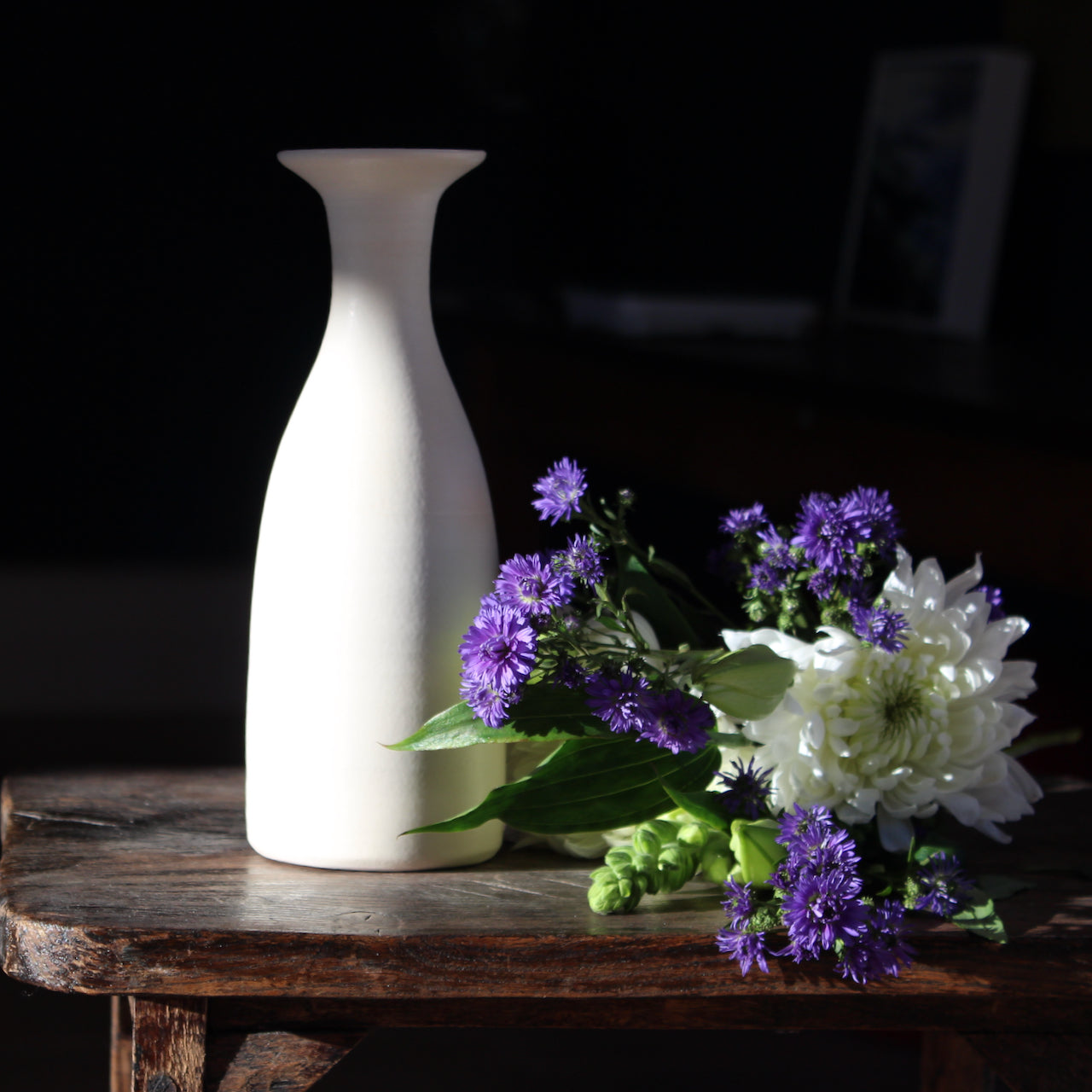 cream coloured ceramic vase by UK ceramicist Lucy Burley.