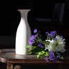 cream coloured ceramic vase by UK ceramicist Lucy Burley.
