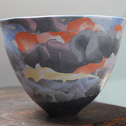 porcelain Nerikomi style bowl in dark purple, orange and yellow by Essex ceramic artist Judy Mckenzie.