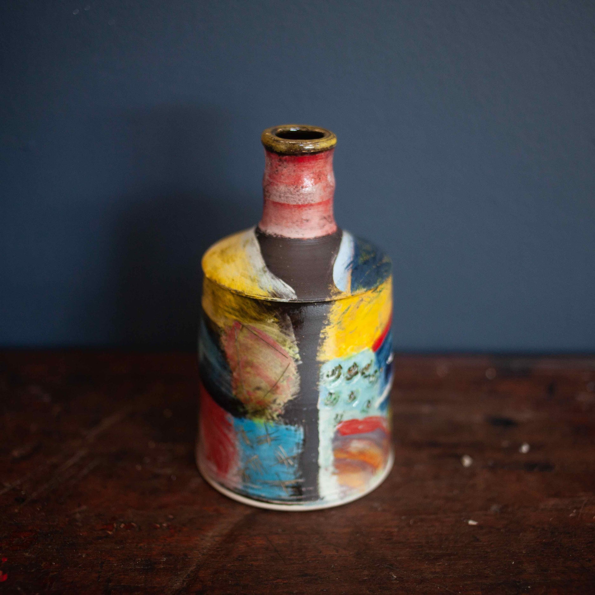 Bright bottle made of pottery by John Pollex
