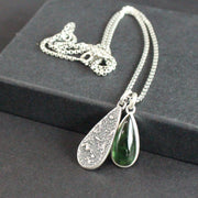 Carin Lindberg - Green tourmaline and textured silver duo pendants close up