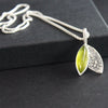 Carin Lindberg - Peridot and textured silver leaf pendant 