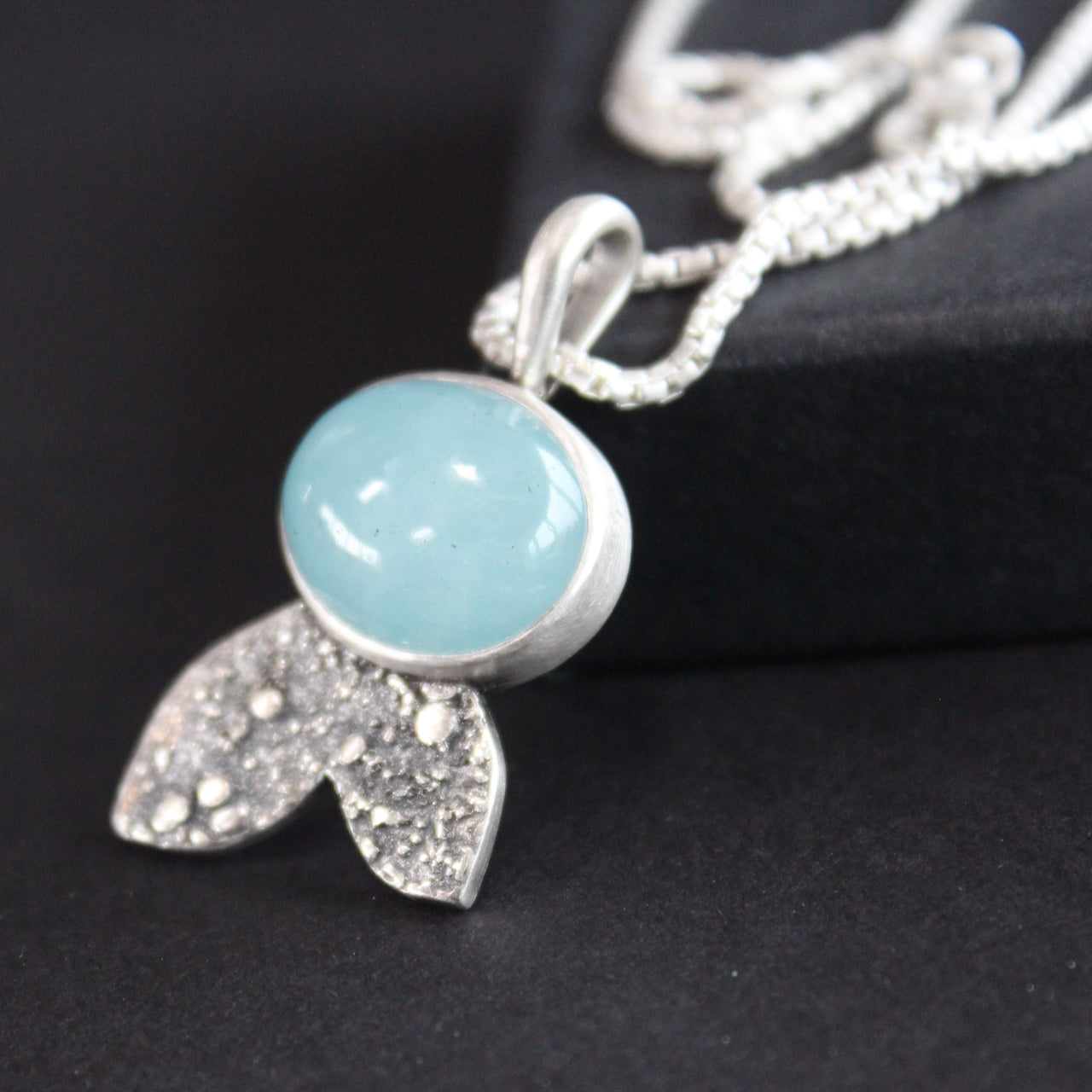Carin Lindberg - Aquamarine and textured silver leaf pendant close up 1