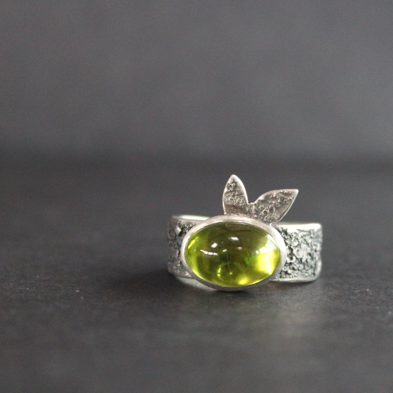 Carin Lindberg - Peridot ring in textured sterling silver with textured leaf detail  main picture