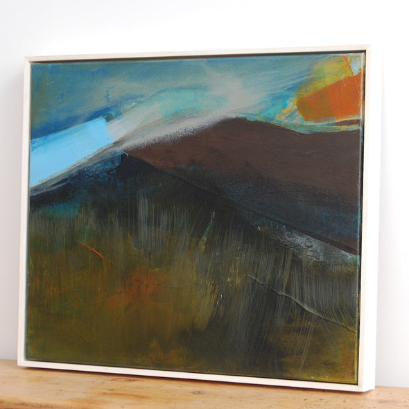  abstract painting by Alice Robinson-Carter of Rame Head peninsula in Cornwall, the peninsula is dark against a blue sky with an orange setting sun, the painting has a simple white frame around it