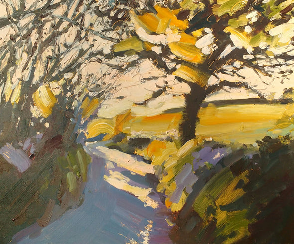Oil painting by artist Jill Hudson of a path with Spring trees in golden light 