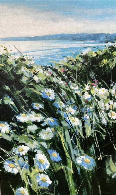 Coastal painting of flowers and the sea in the background by Imogen Bone